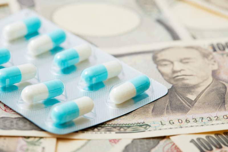 薬と日本円